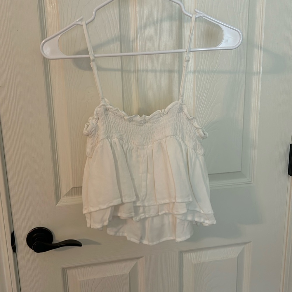 cream flowy top
